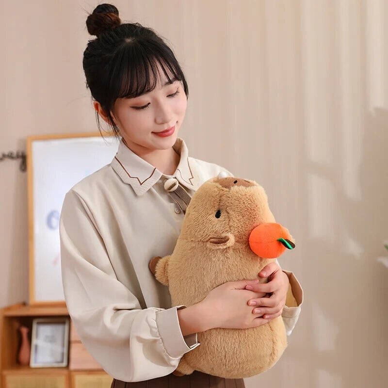 Fluffy Sleepy Capybara with Orange Plushie