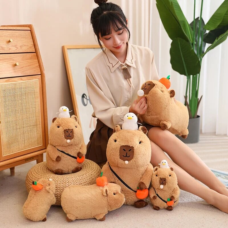 Fluffy Sleepy Capybara with Orange Plushie