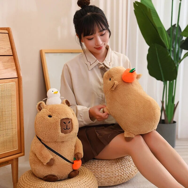 Fluffy Sleepy Capybara with Orange Plushie