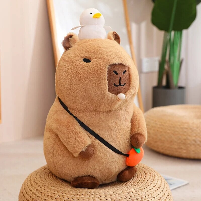 Fluffy Sleepy Capybara with Orange Plushie